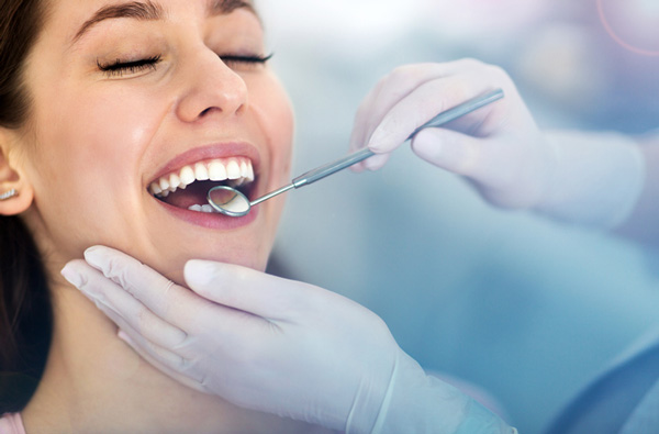 Woman receiving professional dental care at Higher Ground Dentistry in Upland